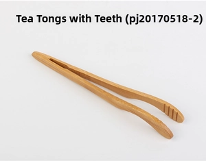 Macro shot of curved bamboo tea tweezers with anti-slip teeth for secure cup handling