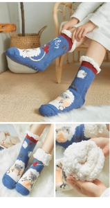 Detail view of blue winter slippers socks with warm fleece lining and non-slip grips