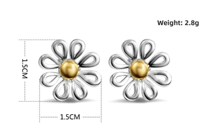 Detail view of daisy stud earrings showing 1.5cm size and 2.8g weight on white background
