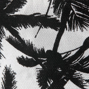 Reversible bucket hat with black and white coconut tree print in cotton canvas fabric