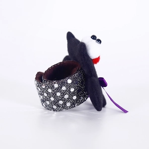 Halloween plush wristband featuring white eyeballs and silver sequined polka dots