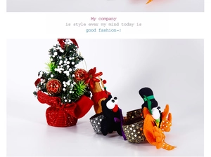 Close-up of festive Christmas hair accessories with reindeer, snowman and sequined trees