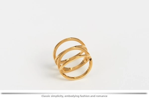 Detail of rose gold triple layered bird nest ring with minimalist hollow design
