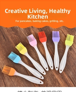 Detailed macro view of seven colorful silicone pastry brushes with translucent PP handles