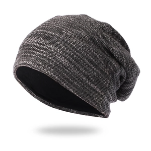 Detail of gray-black mixed knit beanie with thick double-layer warm inner lining