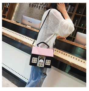 Creative house-shaped crossbody bag featuring pink and black contrast color design