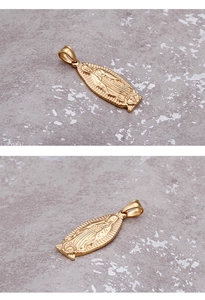 Macro shot of 18k gold plated stainless steel Virgin Mary oval religious pendant