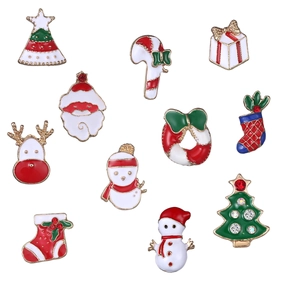 Detailed set of 11 Christmas enamel pins featuring Santa, tree, and reindeer designs