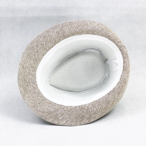 Close-up of Fedora hat interior showing 100% paper material and size 58 label