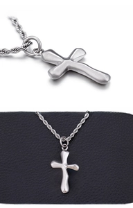 Macro detail of silver stainless steel cross pendant with liquid metal texture on rope chain