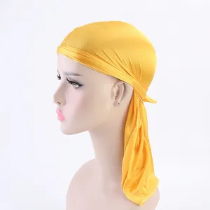 Silky yellow durag with long tail straps for men and women, sleek satin headwrap accessory