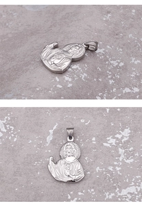 Detailed views of a stainless steel Sacred Heart of Jesus pendant with embossed religious motifs