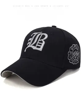 Detailed embroidery of white B letter and Blue Mountain badge on black baseball cap