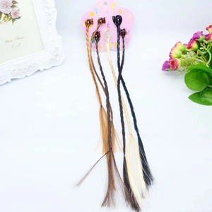 Colorful braided hair extension clips for children set in four diverse natural colors