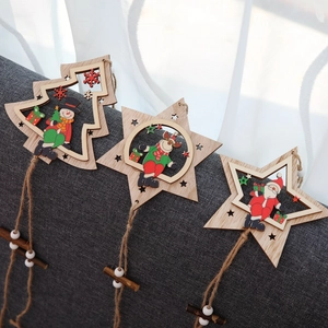 Three wooden Christmas ornaments featuring Santa, reindeer and snowman in star shapes
