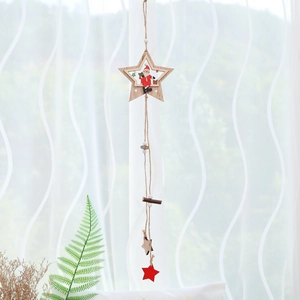 Nordic wooden Christmas tree ornaments with red and white accents hanging on rope