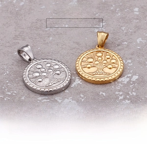 Detailed view of Tree of Life relief pendant in polished gold and silver finish