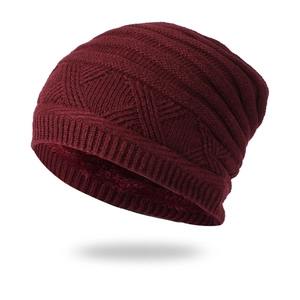 Burgundy winter knit beanie with geometric pattern and thick fleece lining for warmth