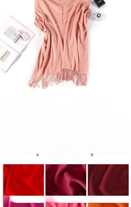 Detailed view of soft pink scarf texture with tassels, 200x68cm size specifications