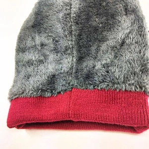 Winter knit beanie with red outer knit and warm grey faux fleece lining for cold weather