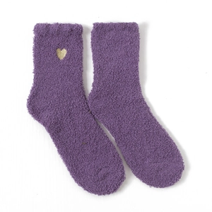 Close-up of soft purple coral fleece socks featuring a delicate golden heart embroidery