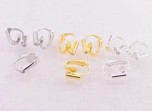 Detail of DIY earring converters in gold and silver finish for non-pierced ears