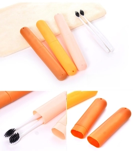 Detail of colorful candy-colored portable toothbrush cases with cartoon bear design