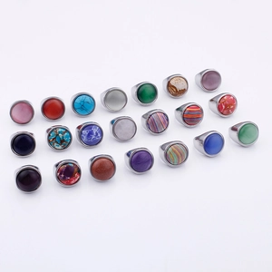 Matrix display of women's stainless steel rings featuring colorful cat eye and turquoise stones