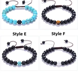 Detail view of adjustable braided bracelets with turquoise, lava stone and tiger eye Style E/F