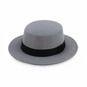 Detailed close-up of grey wool felt boater hat with a classic black ribbon band decoration