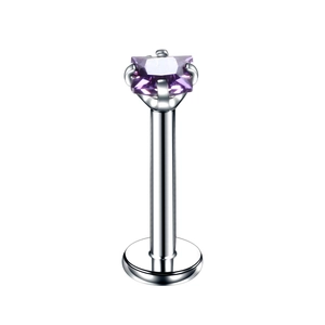 Detail of square purple zircon stud piercing with stainless steel four-prong setting