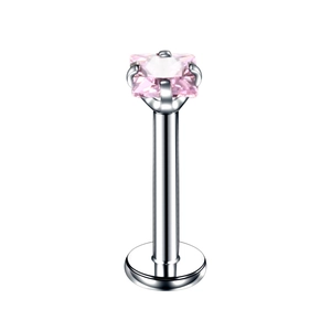 Macro shot of silver stainless steel labret stud with a pink square-cut zircon stone