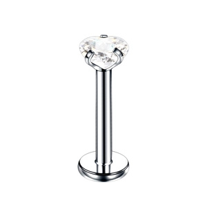 Macro shot of silver heart-shaped cubic zirconia labret stud with a flat back plate