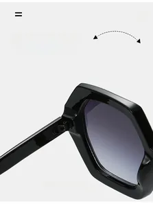 Close-up of durable metal hinge on black hexagon sunglasses with gradient purple lenses