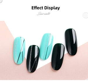 Detail of teal and dark green nail tips with geometric silver glitter line art