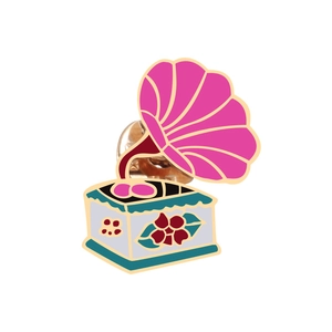 Vintage phonograph enamel pin with colorful floral patterns and gold-plated details