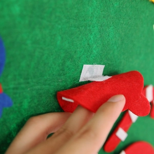 DIY felt Christmas tree ornament with detachable red glove shape using velcro strips