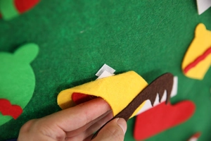 Close-up of DIY felt Christmas tree showing velcro attachments for kids handmade gifts
