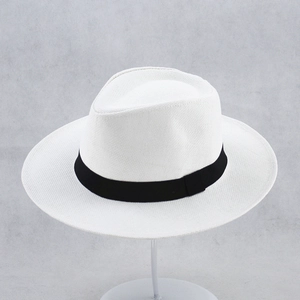 Classic white straw panama hat with black grosgrain ribbon for summer outdoor sun protection