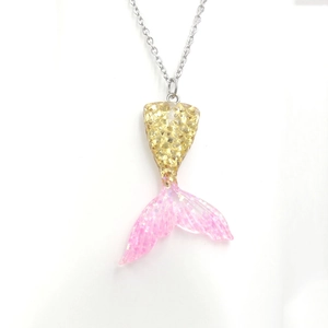 Gradient resin mermaid tail necklace with gold scales and pink glitter fins on silver chain