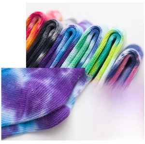Macro detail of Y-shaped reinforced heel and tie-dye cotton fabric on crew socks