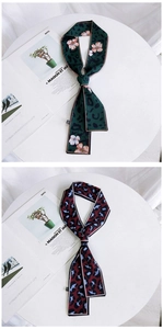 Close-up of double-sided leopard floral print twilly scarves in green and burgundy silk