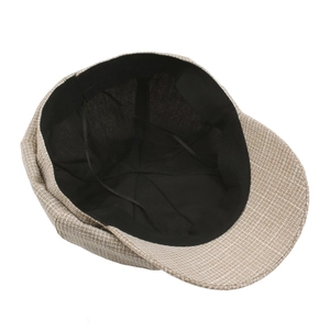 Classic brown plaid newsboy cap with black lining and adjustable inner drawstring