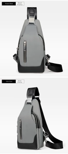 Close-up of gray Oxford fabric chest bag showing metal logo buckle and leather accents