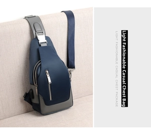 Detail of waterproof Oxford fabric chest bag with USB charging port and metal zipper