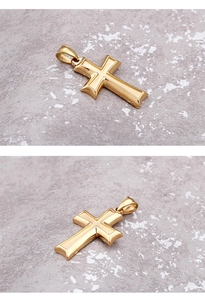 Macro detail of a polished golden stainless steel Ankh cross pendant showing front and back