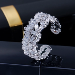 Elegant silver open ring featuring a row of baguette-cut AAA cubic zirconia stones