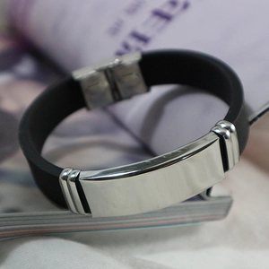 Men's sleek black rubber bracelet with silver stainless steel metal bar plate for engraving