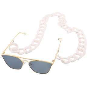 Cat-eye sunglasses with gold metal frame and thick white acrylic decorative chain