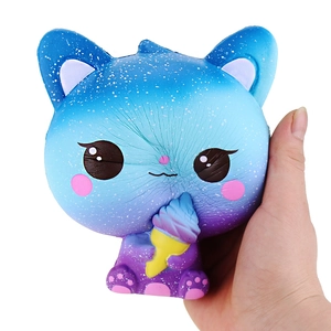 Detail of slow-rising squishy toy featuring blue and purple galaxy ice cream cat design